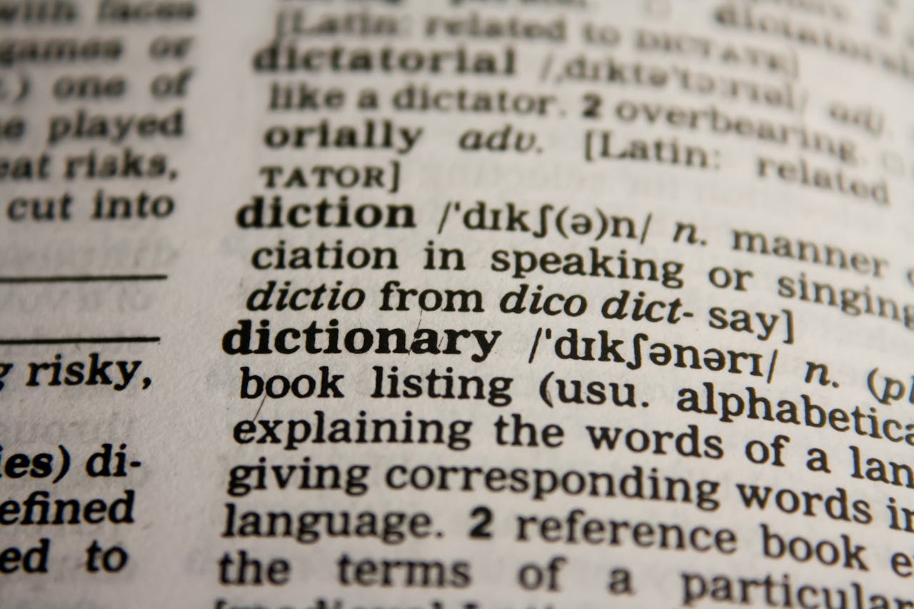 Detailed close-up view of a dictionary page highlighting the word 